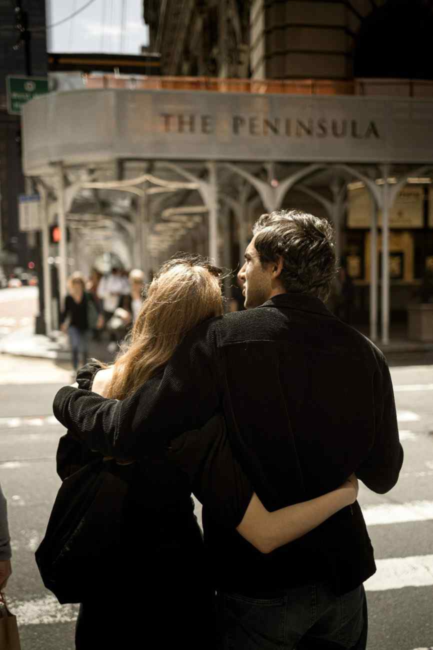 Cinematic photo of a couple on a beach at sunset